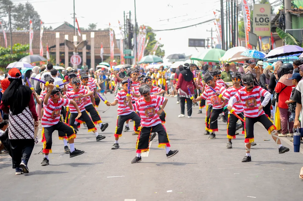 Children dressed in vibrant costumes perform a traditional parade dance on a bustling street.